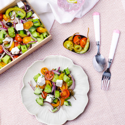 Lebanese cucumber, cherry tomato, spanish onion, salad mix, feta, pickles, olives & lemon & oregano dressing