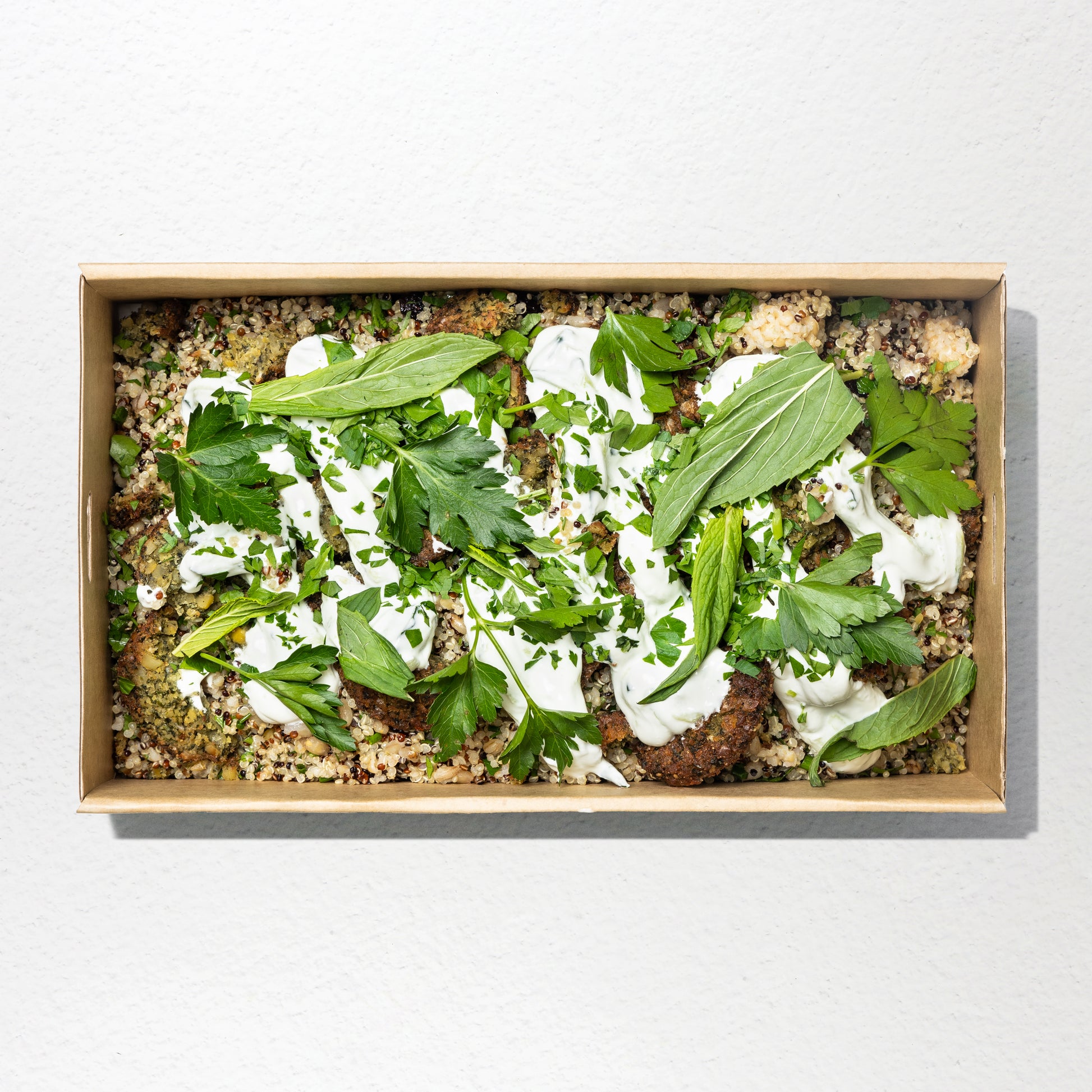 Order wholesale falafel and grains salad for cafes, caterers and offices. Bulk vegetarian salad with grains, herbs and tzatziki.