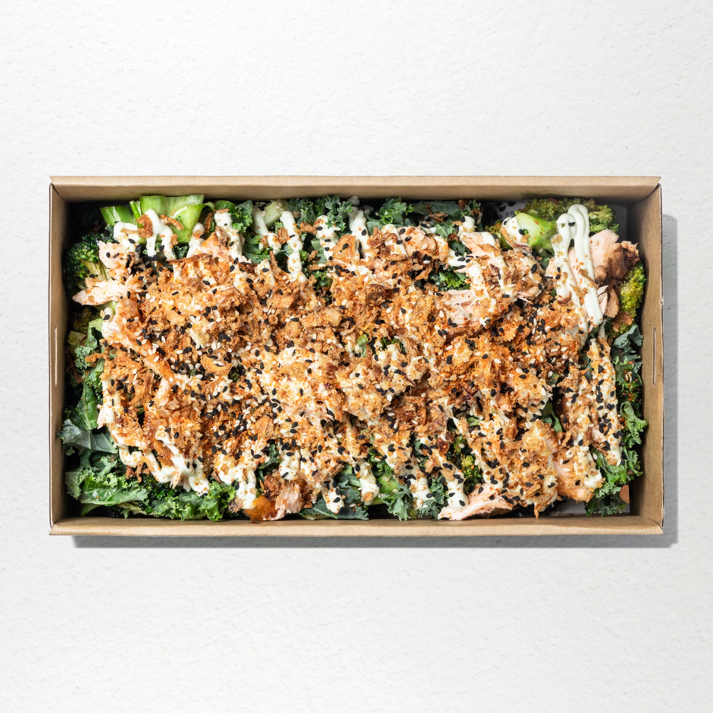 Miso salmon, kale, sesame roasted broccoli, wasabi kewpie mayo, crispy onions & togarashi salt 