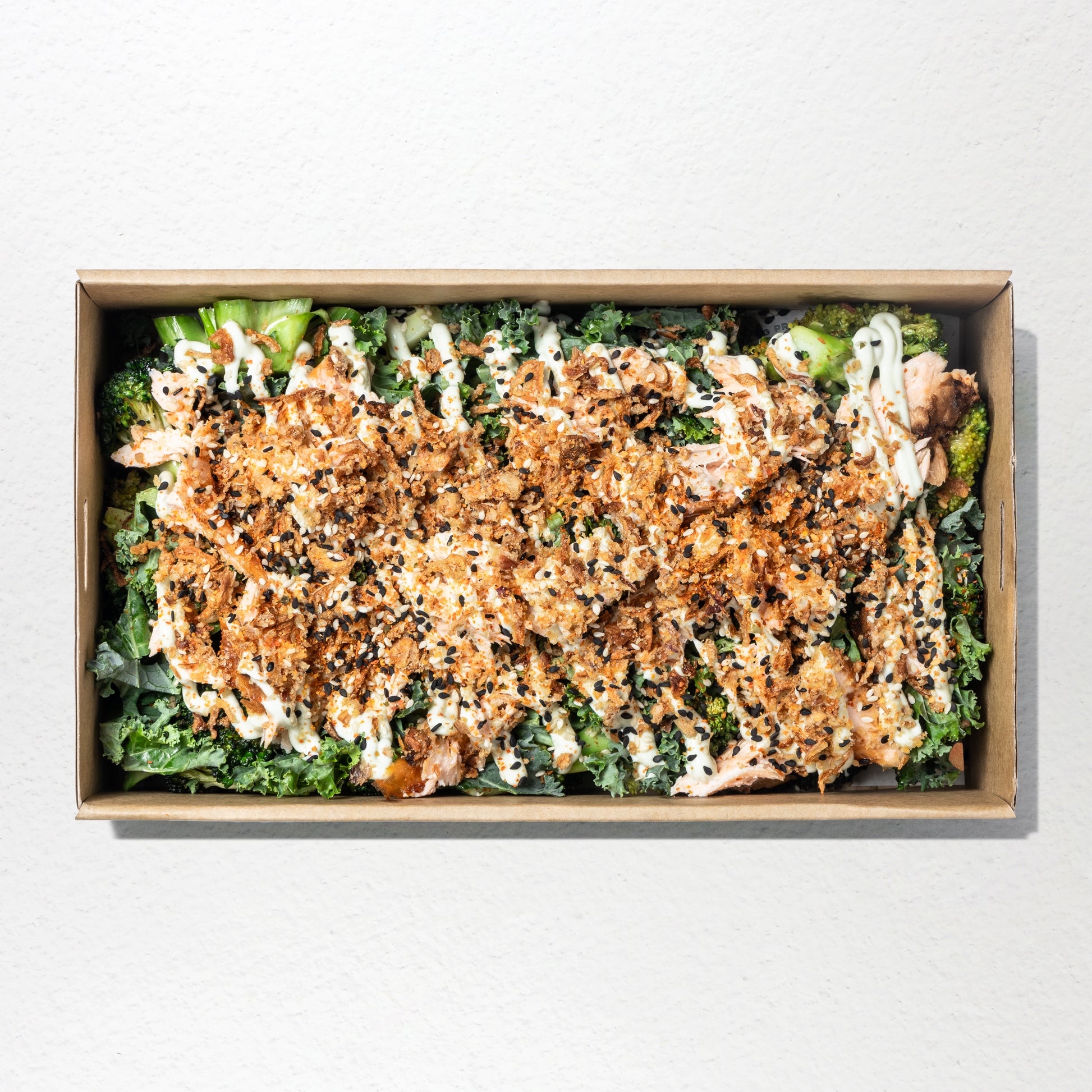 Miso salmon, kale, sesame roasted broccoli, wasabi kewpie mayo, crispy onions & togarashi salt 